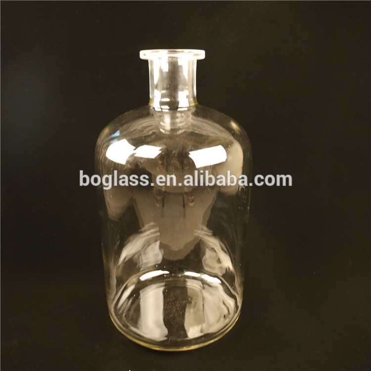 Clear lab reagent glass bottle with mouth