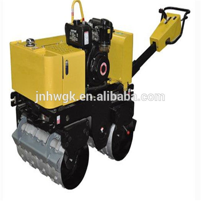 Small walk behind road roller used for trench