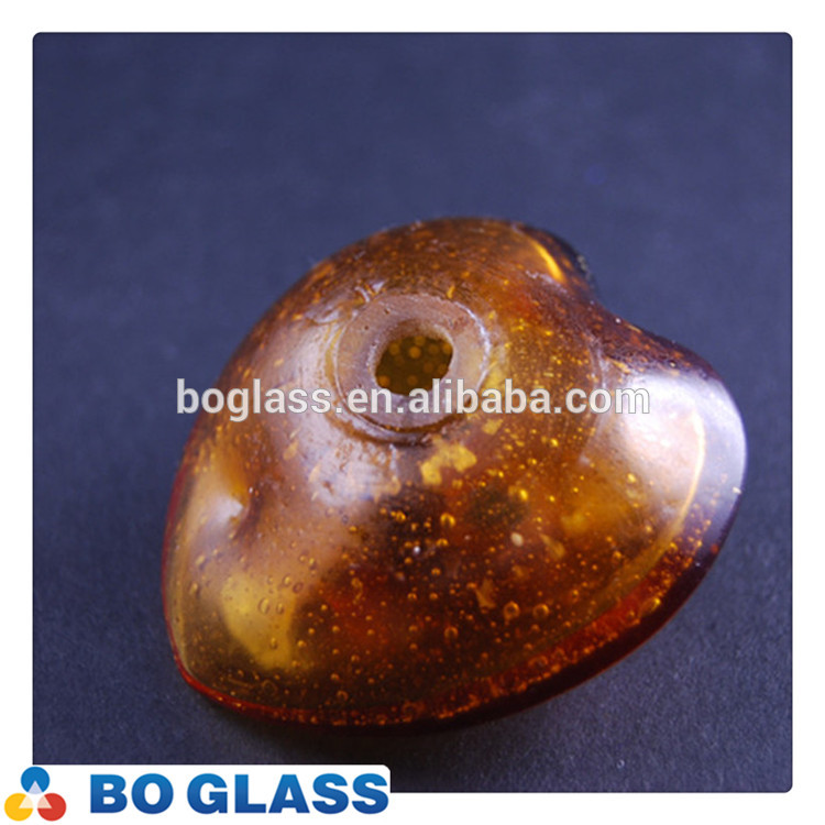 Hand blown amber color glass shade for lighting use