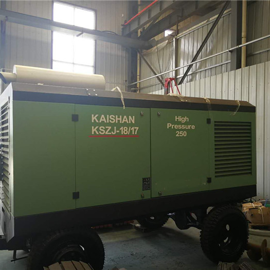 Air compressor for water well drilling rig