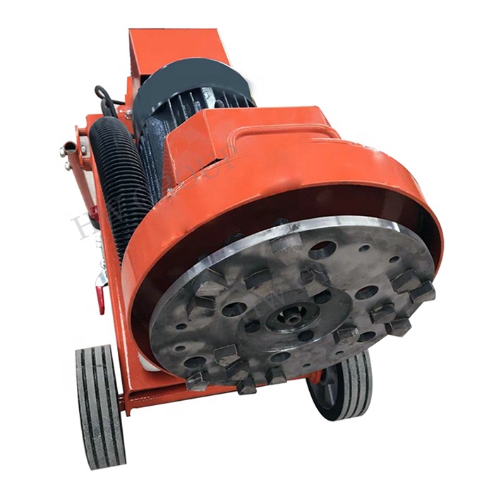 Concrete floor surfacing grinder