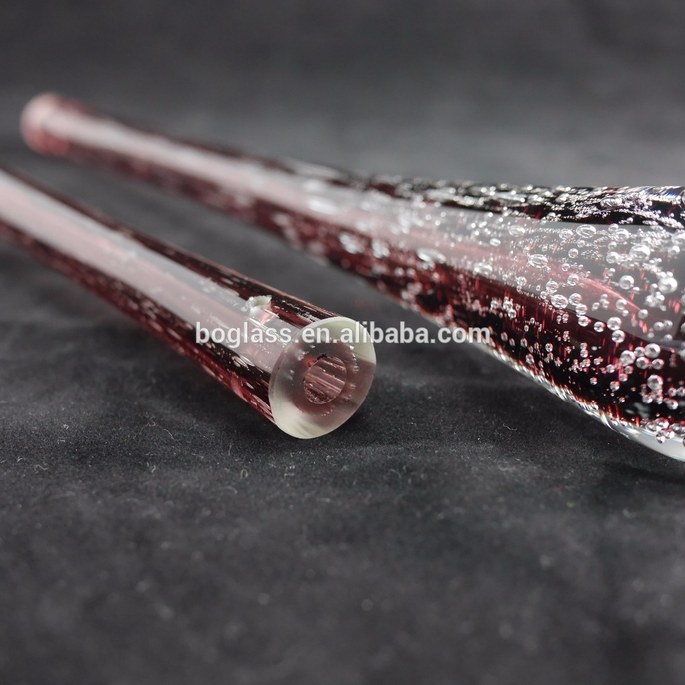 red glass drop with small bubble