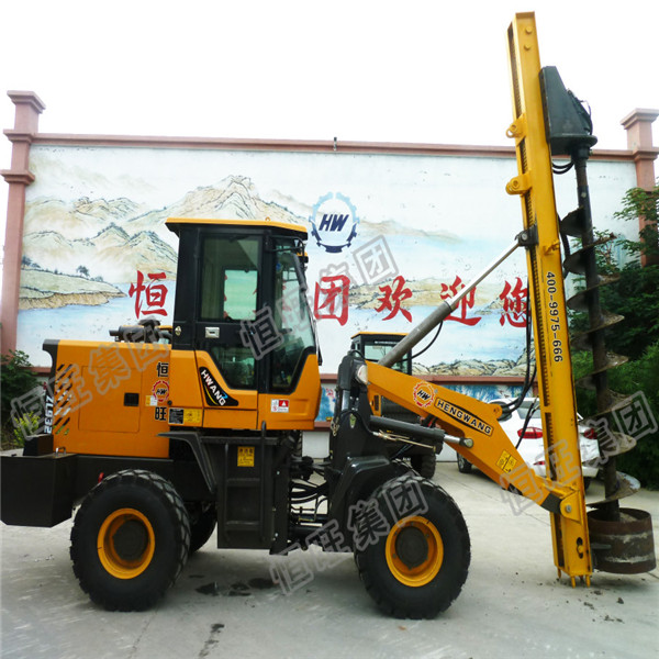 Multifunction front loader drill attachment auger