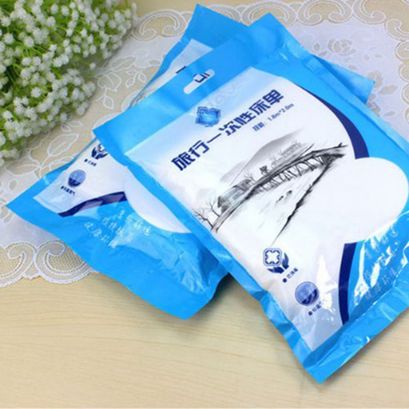 Hot Sale 1 pcs Portable Travel On Business Non-Woven Disposable Bed Sheets Beauty Salon Hotel Sterile Sheets