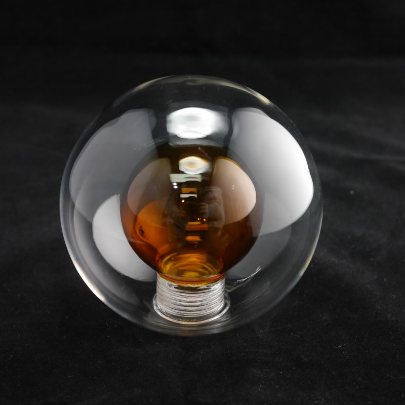 Hand made blown double wall borosilicate glass pendant light pyrex glass bulb shell with an amber inner bulb