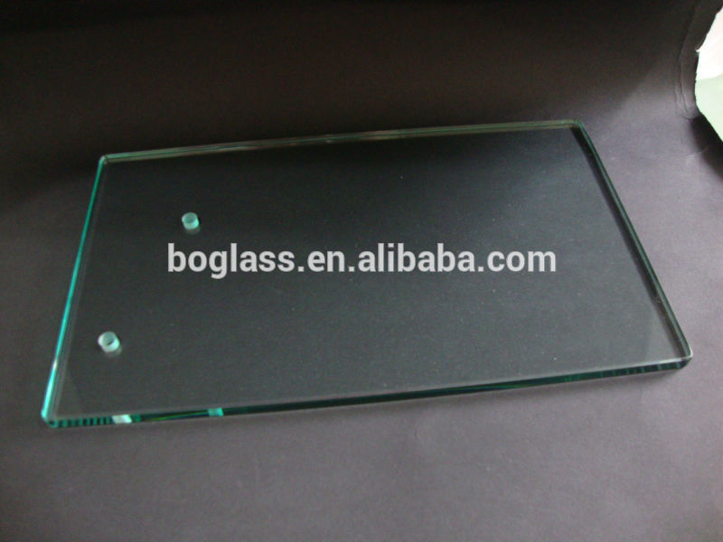 High clear heat resistant glass sheet for microwave oven