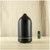 Elegant ultrasonic air essential oil diffuser ceramic aroma diffuser with warm white LED light smooth mist