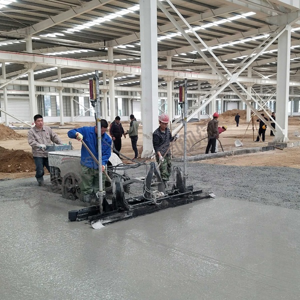 Floor level machine laser concrete vibrating screed