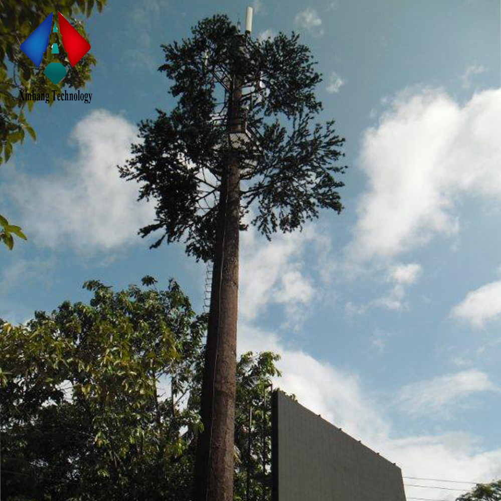 camouflaged telecom tree cell phone signal antenna tower