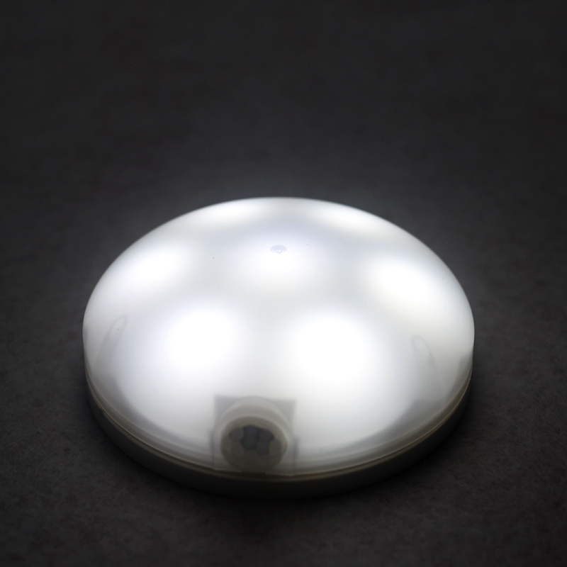 Long duration time AAA battery 0.5W round motion sensor LED cabinet light for bathroom corridor