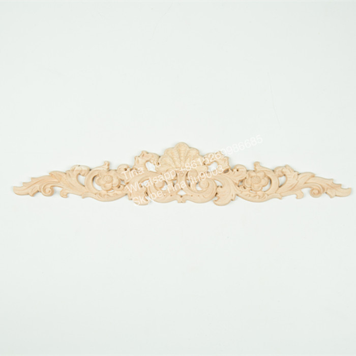 Hand carved unpainted wood onlays, wood appliques