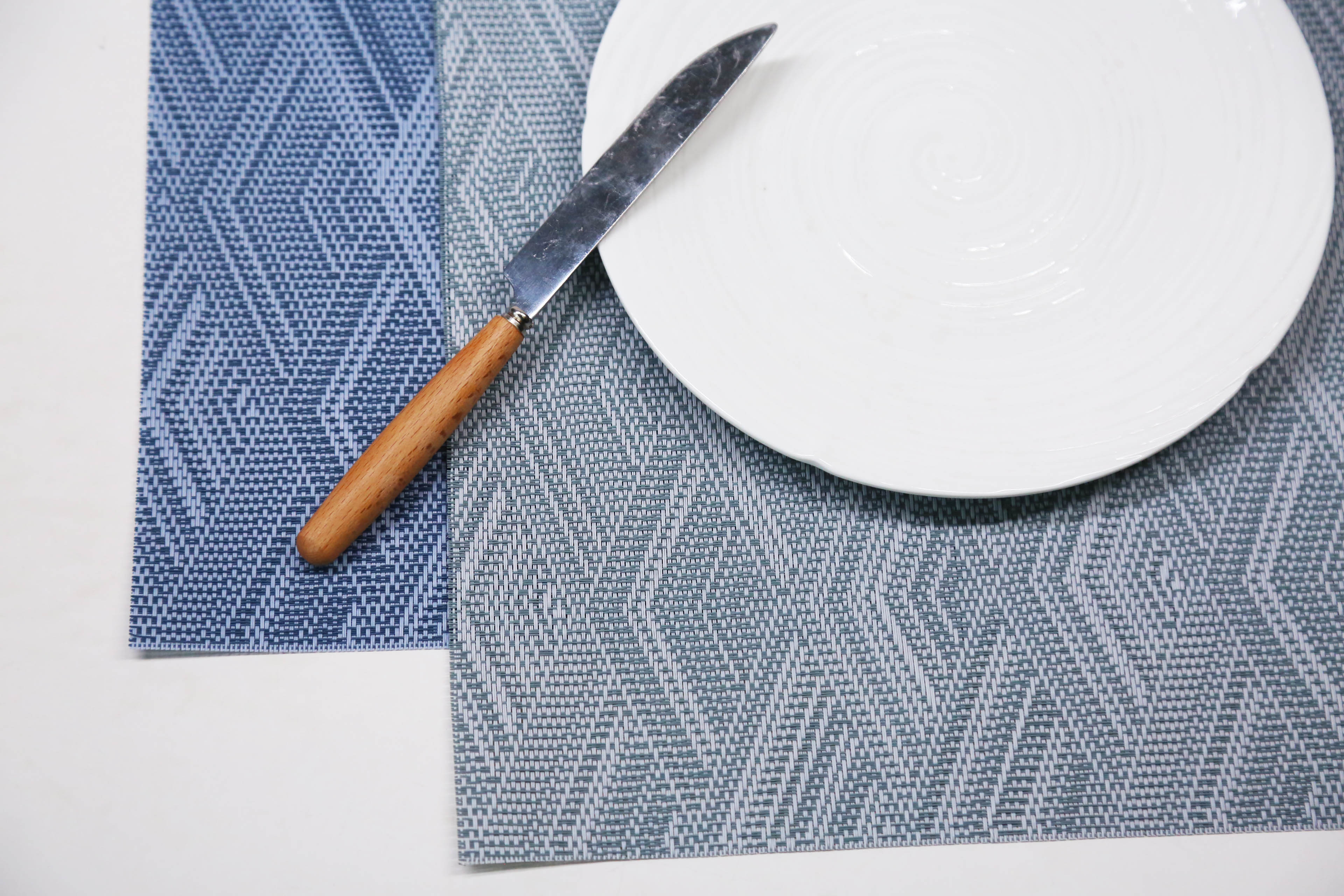 Stock Wholesale PVC Jacquard Geometric Dining Table Mats Anti Slip Woven Decorative Placemats Washable Kitchen Table mats