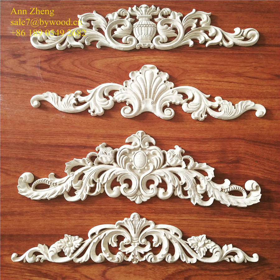 solid wooden material and hand carved wood appliques and onlays