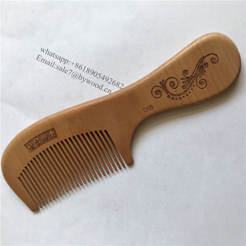 Hand carved wood hair combs